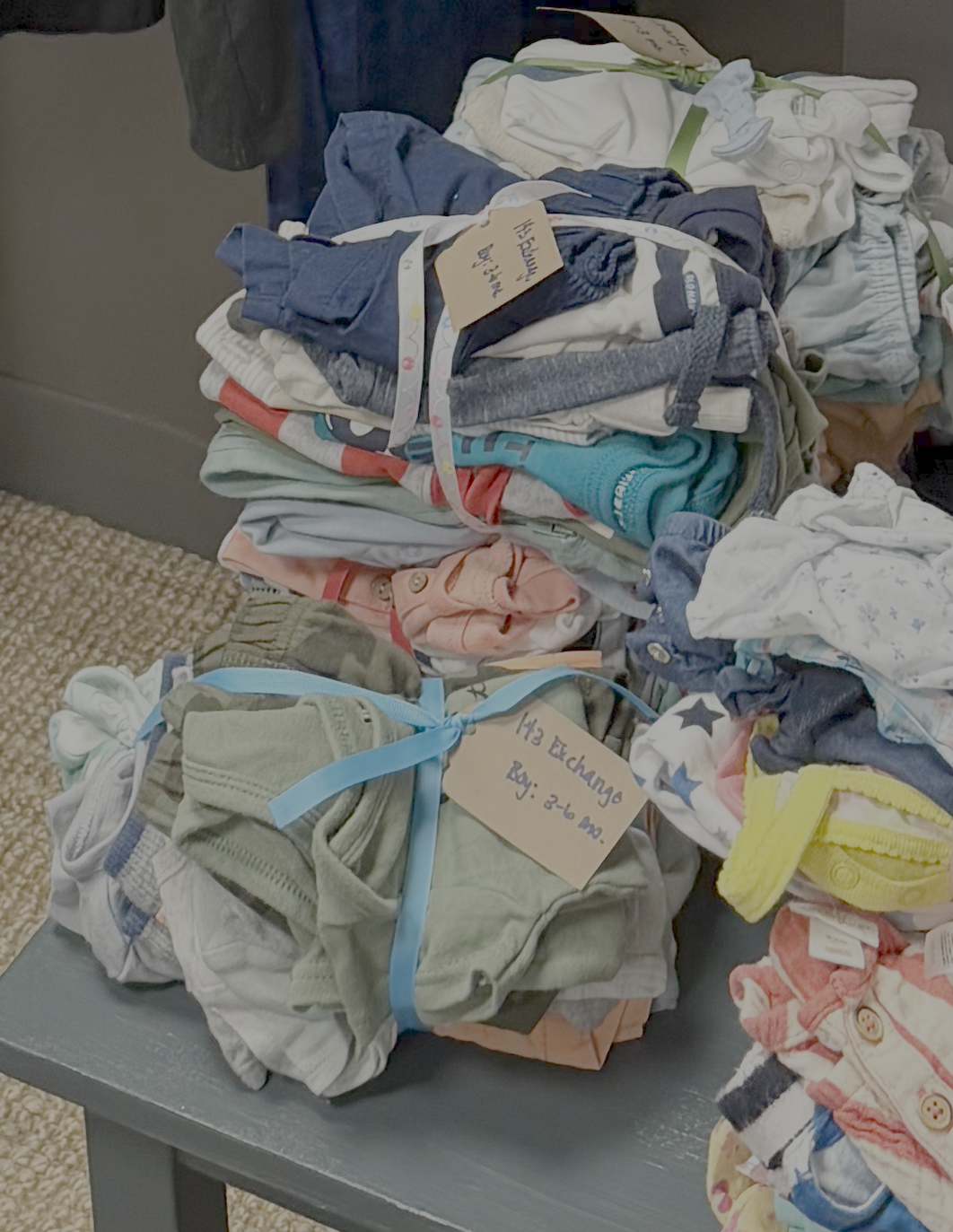 Bundled clothing packages ready for delivery to families in need
